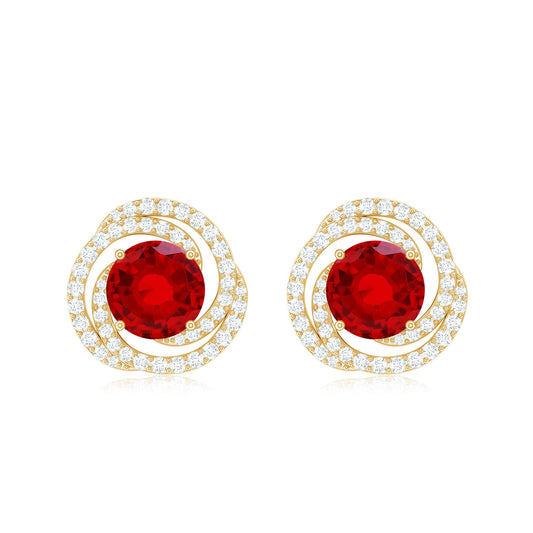 Lab Created Ruby and Diamond Spiral Stud Earrings