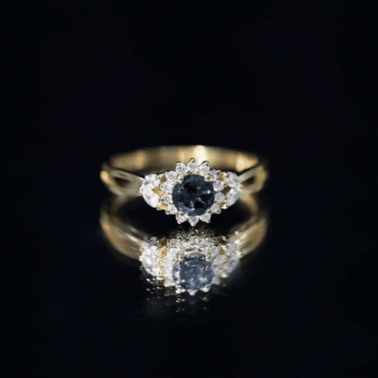 0.6 Carat London Blue Topaz Floral Engagement Ring with Diamond
