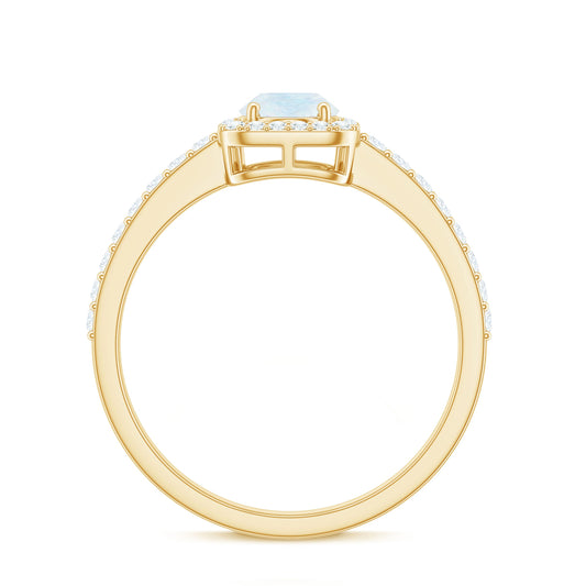 0.6 Carat Oval Cut Moonstone Ring with Diamond Halo