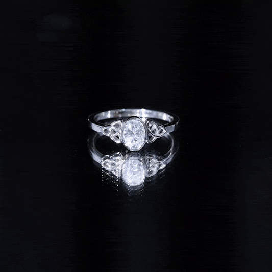 Oval Moissanite Solitaire Celtic Knot Ring in Bezel Setting