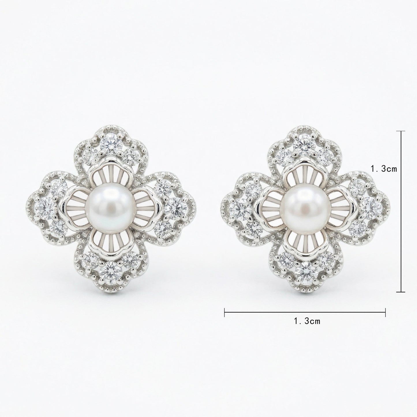 925 Sterling Silver Elegant Floral Pearl and Sparkling Accent Stud Earrings in White Metal