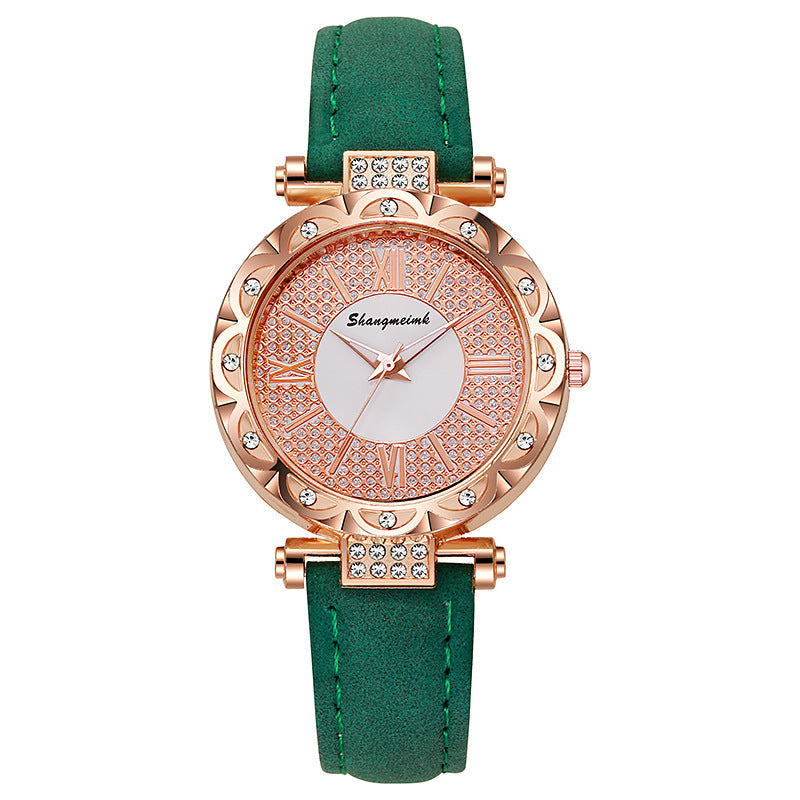 Korean-style quartz watch with a simple leather strap.