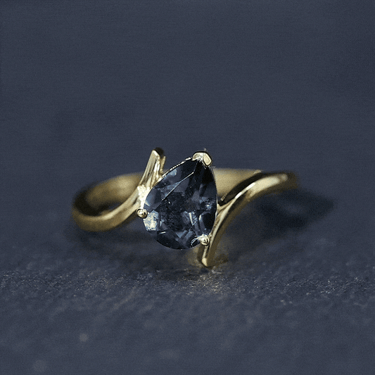 1 Carat Pear Shape London Blue Topaz Solitaire Ring with Bypass Shank