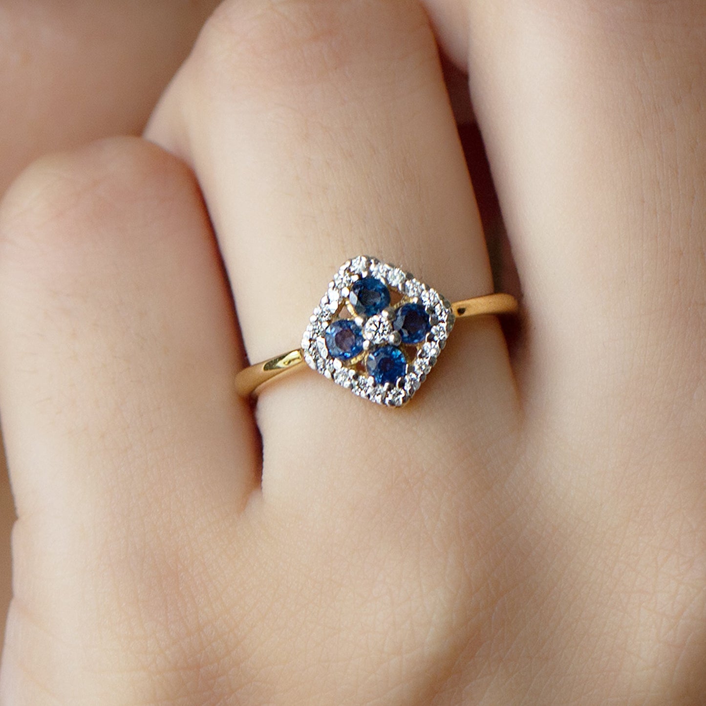 Blue Sapphire Cluster Ring with Diamond Accent