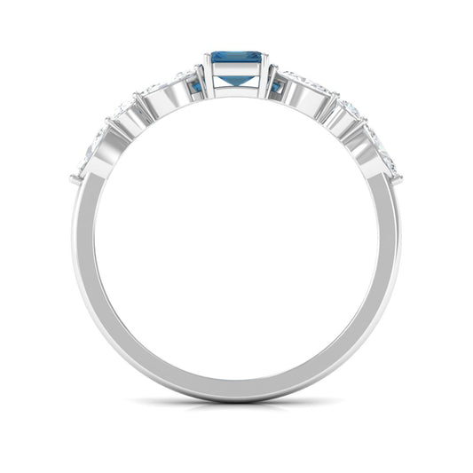 0.7 Carat Emerald Cut London Blue Topaz Solitaire Ring with Diamond