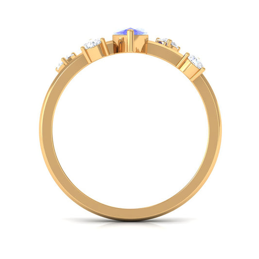 0.6 Carat Marquise Tanzanite Solitaire Ring with Scatter Diamond