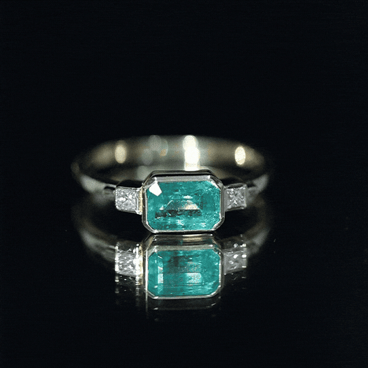 Octagon shape Emerald and Diamond East-West Promise Ring in Bezel Setting