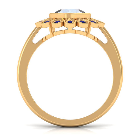 0.8 Carat Bezel Set Moonstone Vintage Inspired Engagement Ring with Blue Sapphire