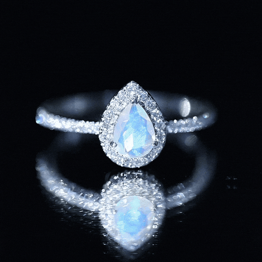 0.7 Carat Natural Ethiopian Opal Teardrop Engagement Ring with Diamond Halo