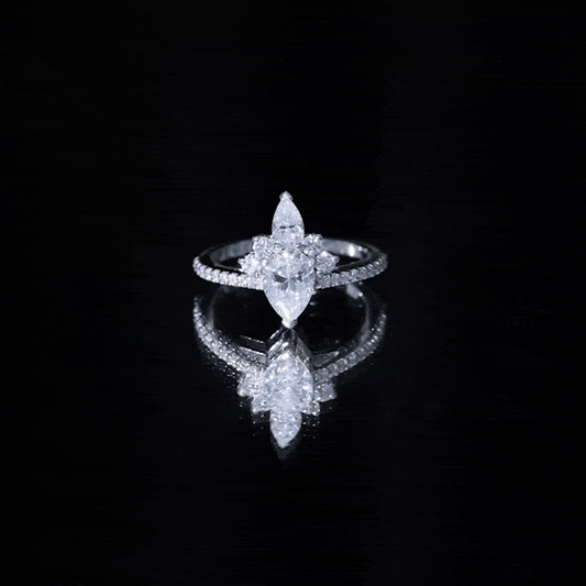 0.7 Carat Pear Shape Moissanite Crown Engagement Ring