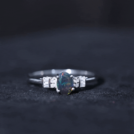 0.9 Carat Oval Cut Black Opal Engagement Ring with Diamond