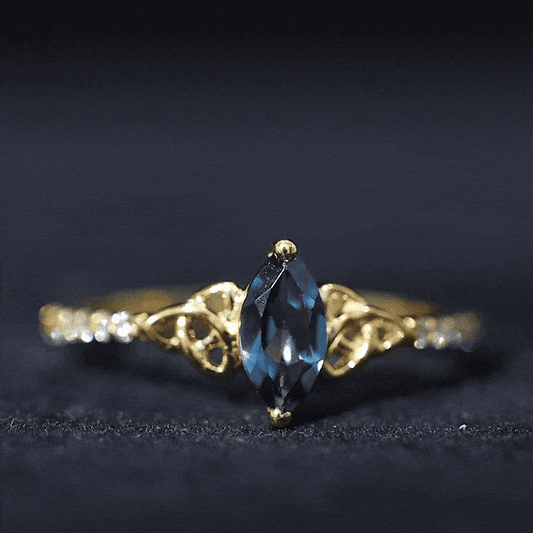 0.74 Carat Marquise Cut London Blue Topaz Celtic Engagement Ring with Diamond